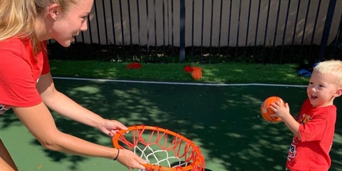 Woman coaching basketball