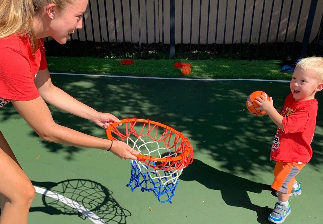 Woman coaching basketball